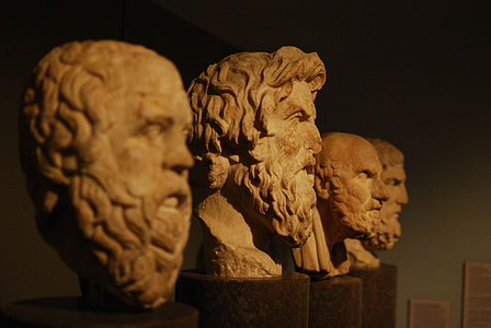 photo of four men head busts thumbnail