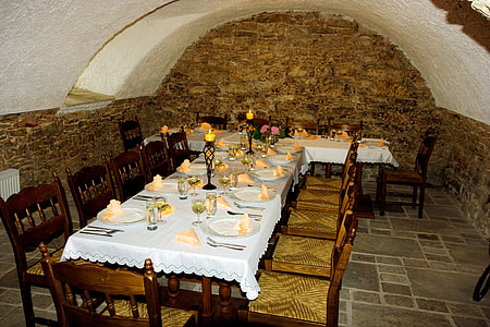 table setting on brown wooden table with chairs thumbnail