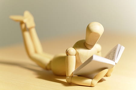 reading marionette figurine thumbnail