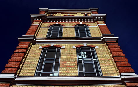 brown and beige painted building thumbnail