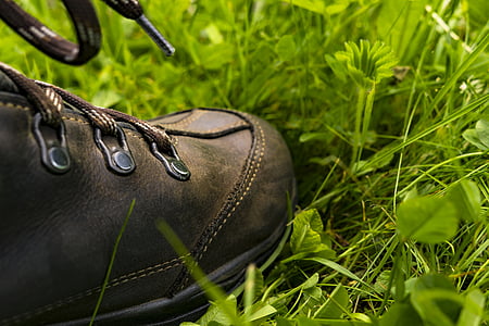 person stepping on grass thumbnail