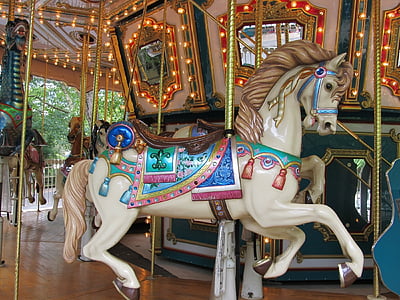 white, blue, and brown horse carousel thumbnail