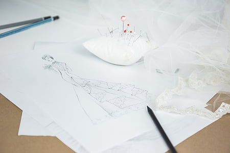 white pillow on white fabric thumbnail