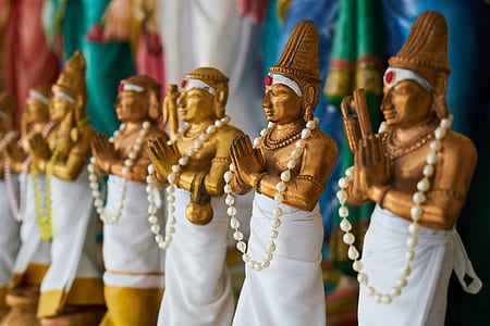 shallow focus photo of wood carved figures thumbnail