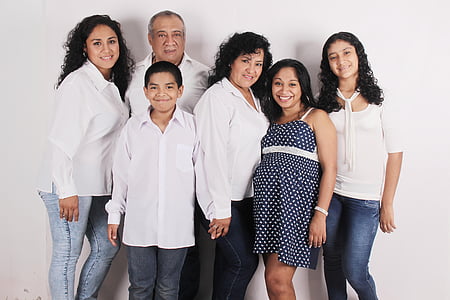 group of people smiling for a photo against white background thumbnail