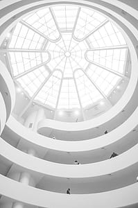 group of people inside spiral dome building thumbnail