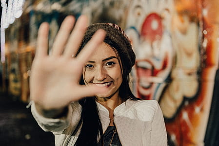 Woman Wearing White Cardigan thumbnail