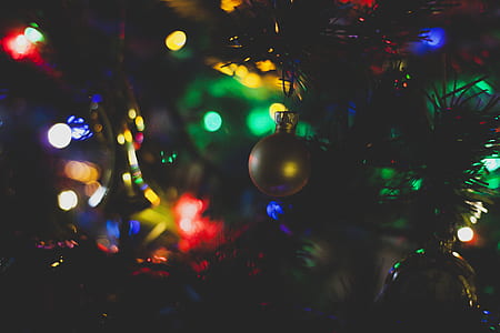 Closeup Photography of Christmas Bauble Hanging on Tree thumbnail