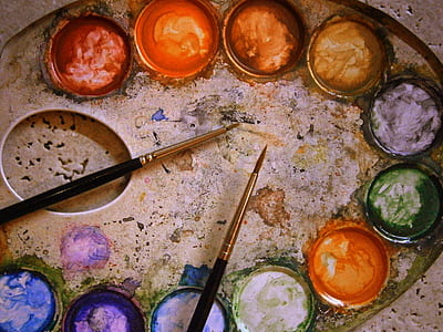 two paint brushes on paint bucket thumbnail