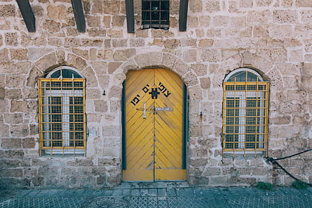 photo of closed yellow wood door thumbnail