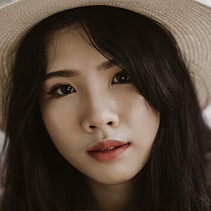 Woman Wearing Brown Hat thumbnail