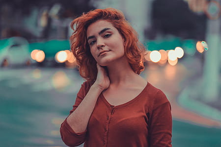 woman wearing brown top selective focus photography thumbnail