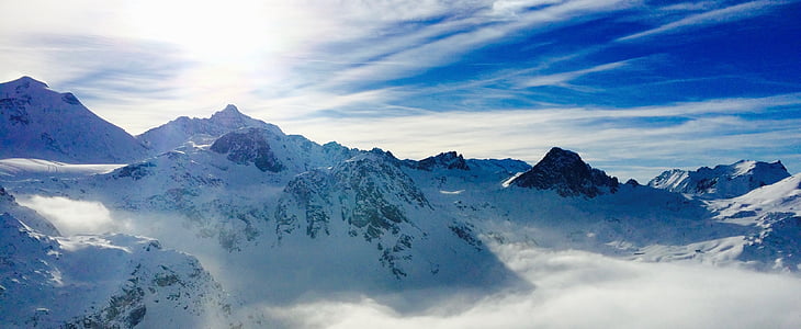 bird's-eye view of mountain covered with snow thumbnail