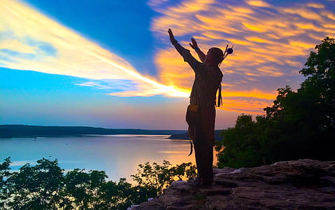 person standing on rock thumbnail