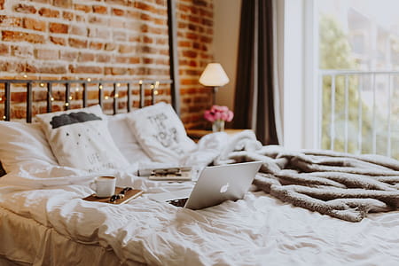 Morning coffee in bed. Working in bed thumbnail