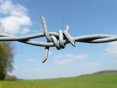 closed-up photo of gray barb wire thumbnail