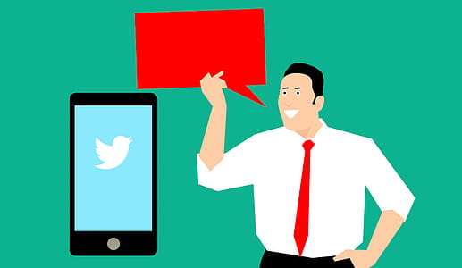 Marketing man talking about social media marketing with mobile device - empty speech bubble. thumbnail