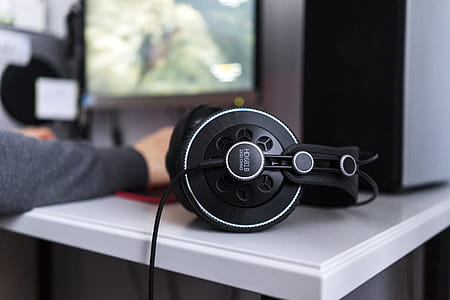 Black Corded Headset on White Table thumbnail