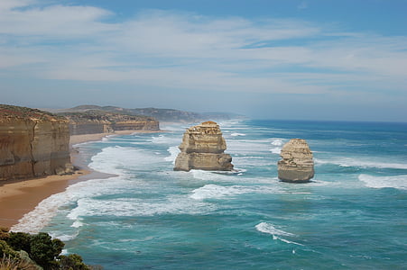 aerial photography of rock formation on body of water thumbnail