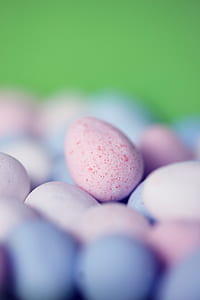focus photography of pink egg thumbnail