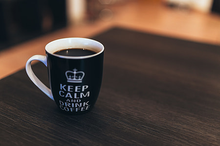 Black & White Coffee Mug on Desk thumbnail