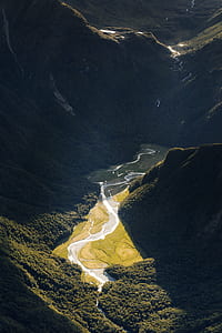 aerial view photography of green mountains and trees thumbnail