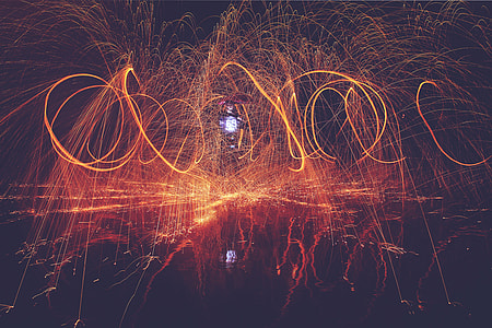 A man light painting at night thumbnail