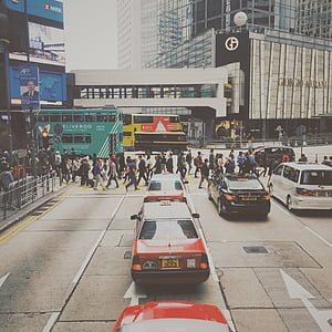 road with crowding people and vehicles thumbnail
