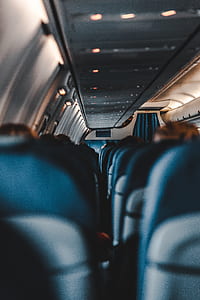 people sitting inside plane thumbnail