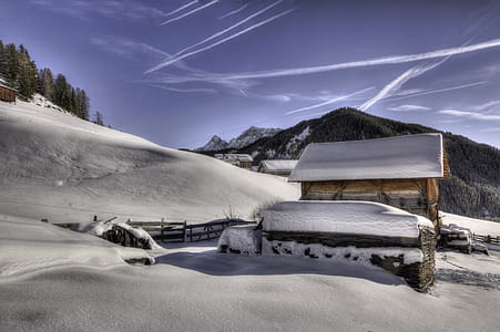 Brown Wooden House Covered With Snow thumbnail