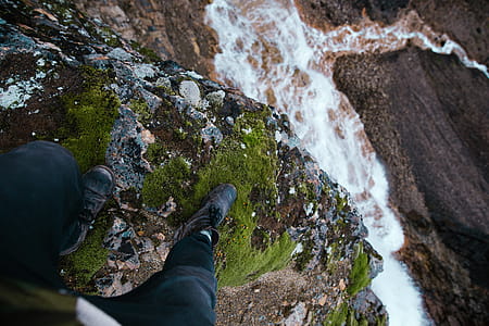 Standing At Waterfalls Edge Photo thumbnail