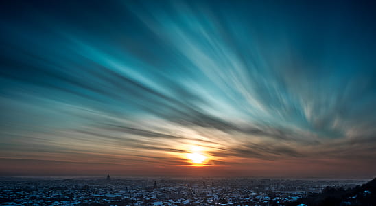 time lapse photography of clouds during golden hour thumbnail