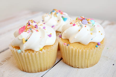 three cupcakes with toppings thumbnail