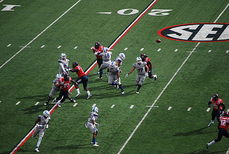 football player in play taken at daytime thumbnail