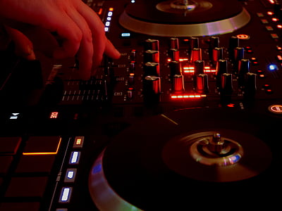 person operating DJ controller thumbnail