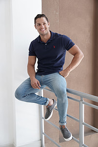 man sitting on steel frame thumbnail