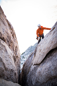man on top of rock thumbnail