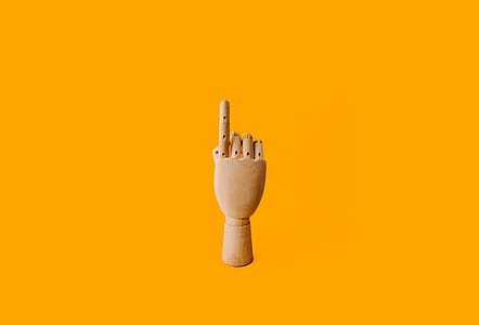 wooden hand pointing thumbnail