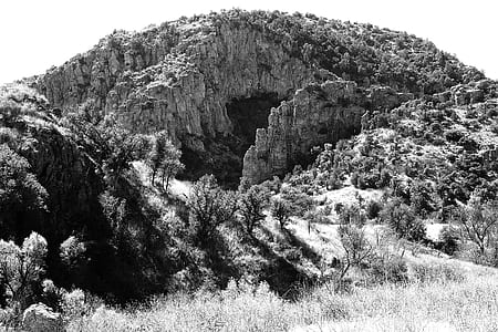 Gray Scale Photo of Mountain during Daytime thumbnail