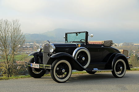 vintage car at asphalt road during daytime thumbnail