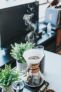 clear glass coffee pitcher on table thumbnail