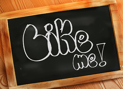 Bike me text on black board thumbnail