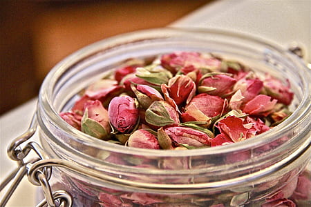 pink rose buds in clear glass bowl thumbnail
