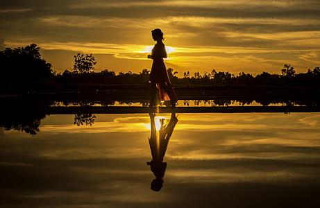 silhouette photo of woman thumbnail