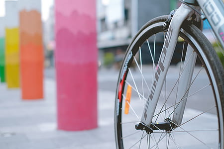 gray bicycle near pink post thumbnail