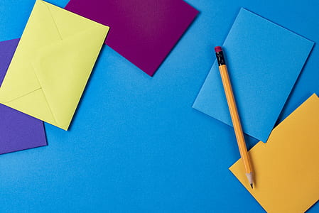 brown pencil with colored papers thumbnail