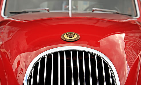 close-up photography of classic red vehicle thumbnail