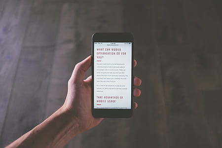 person holding black Android smartphone thumbnail