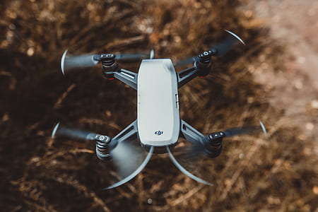 Selective Focus Photography of White and Black Quad Copter thumbnail