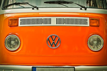 red and white Volkswagen Kombi thumbnail